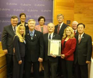 Millennium Dental Technologies, Inc. representatives and members of the Cerritos City Council.